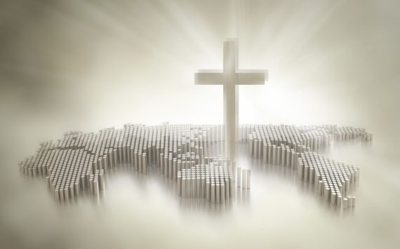 Cross over a world map representing Christian missions